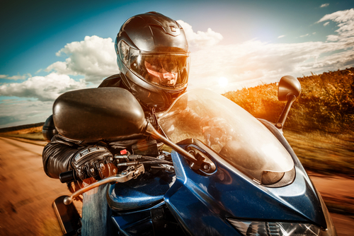 man riding motorcycle