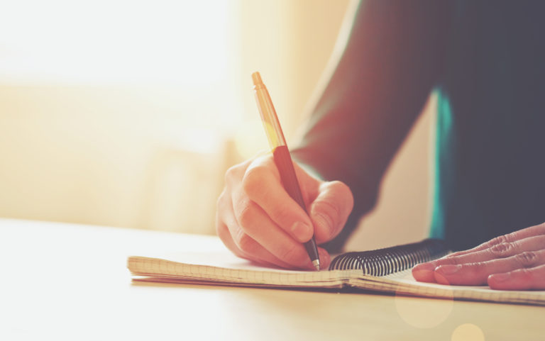 accident victim writing in her post-accident journal