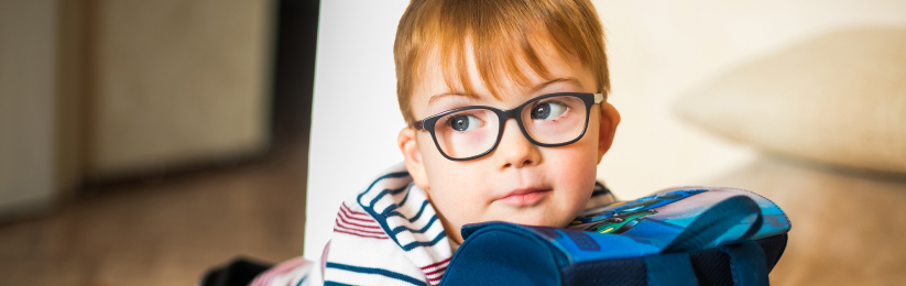 child with glasses